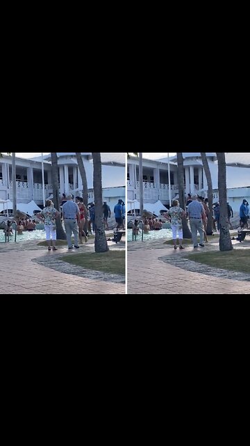 Elderly couple adorably dance together while on vacation