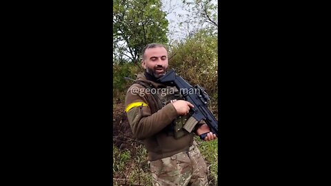 The militants of the "Georgian Legion" pose with FN SCAR-L assault rifles and FIM-92 Stinger MANPADS