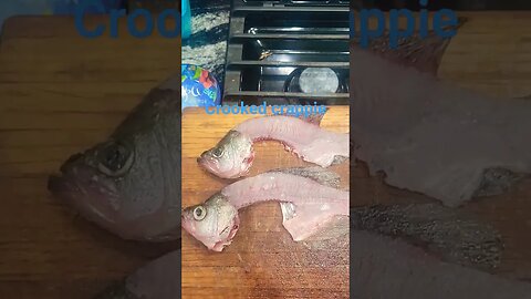 Crappie with spinal injury still alive and caught.