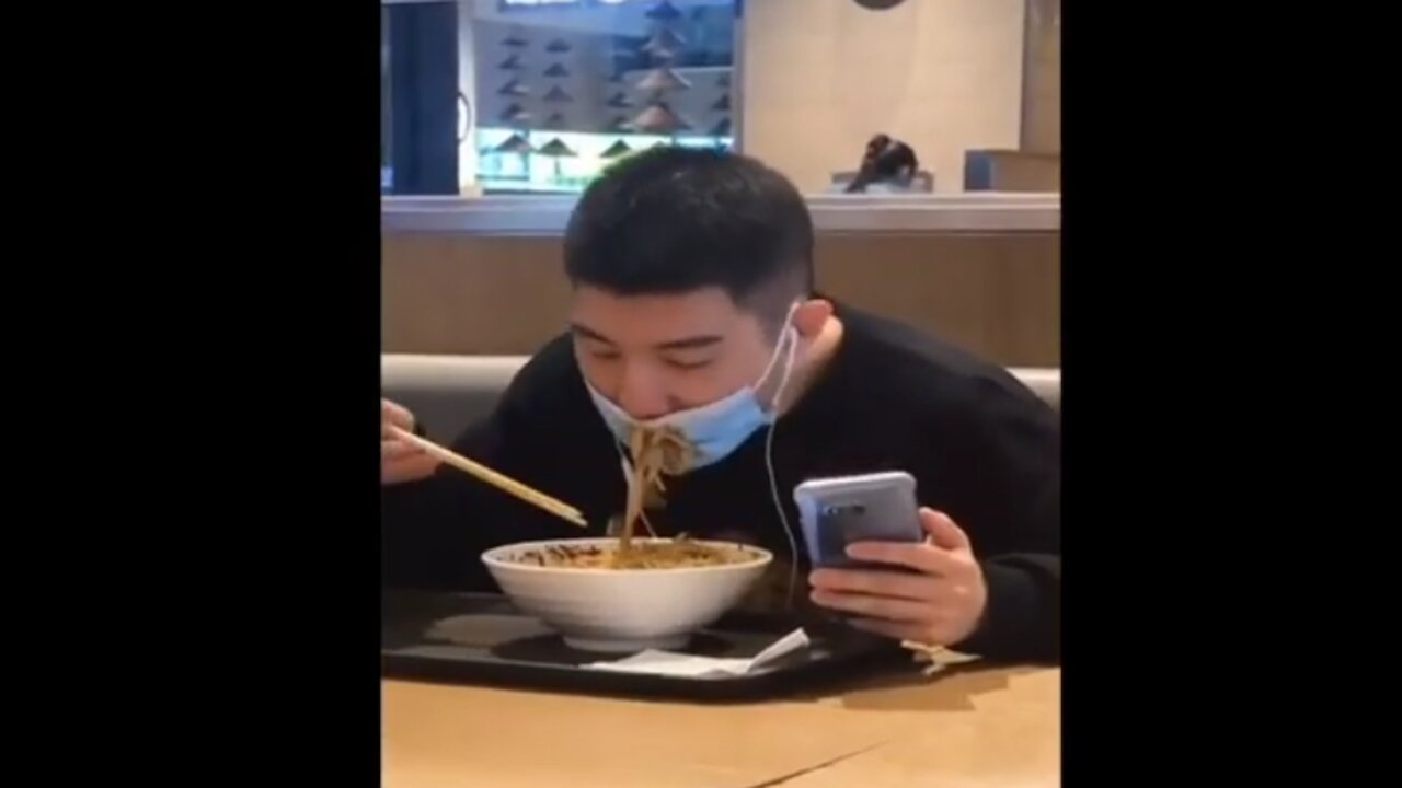 Man forgets to remove mask before eating spicy noodles 😂😂
