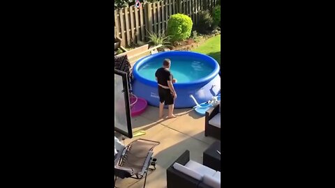 Swimming pol and dog