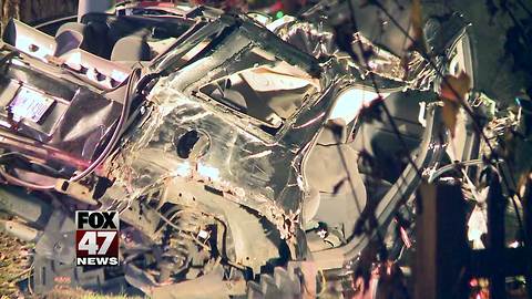 Driver, passenger killed in pin-in crash in Lansing