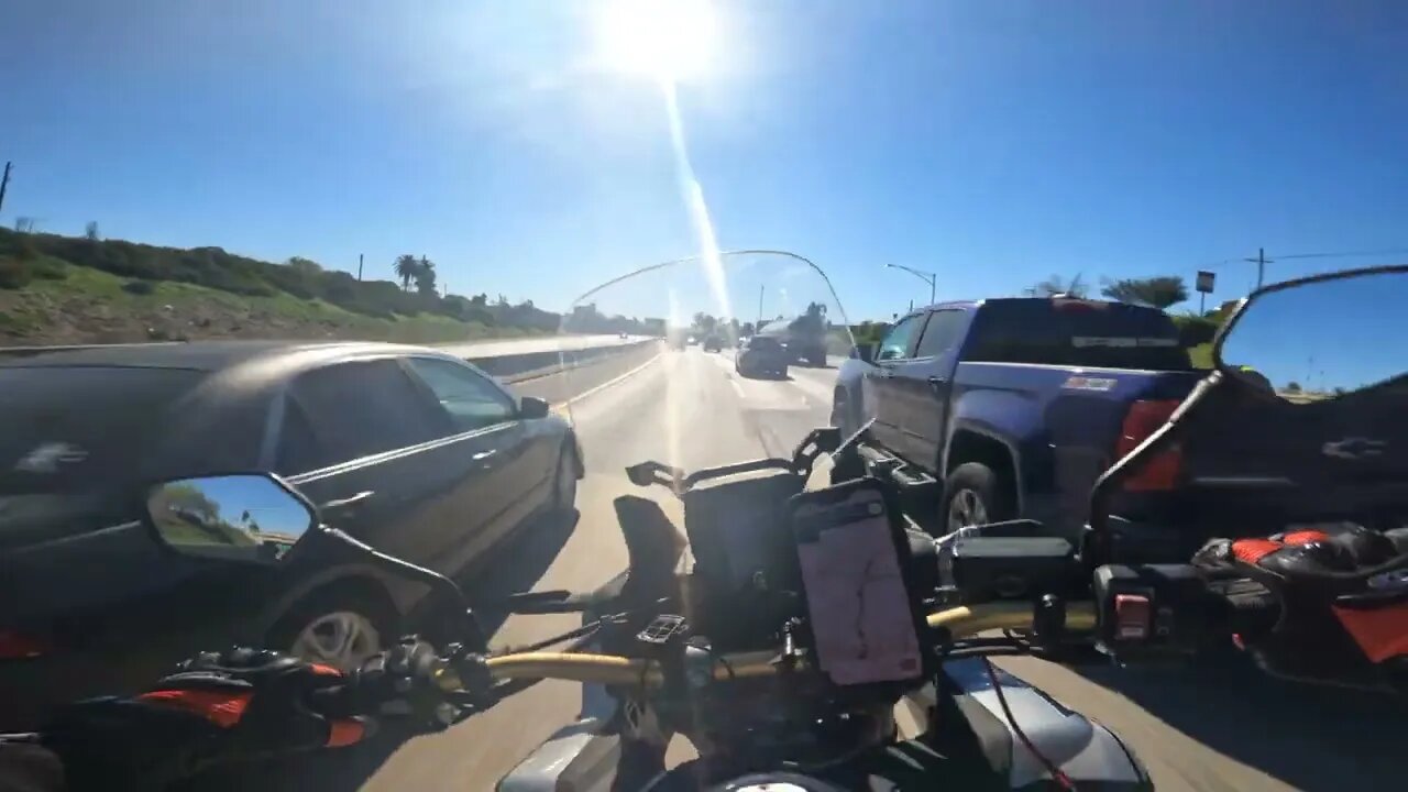 MOTORCYCLE CLOSE CALL ON FREEWAY LA HEAVY TRAFFIC BABY CAR SEAT