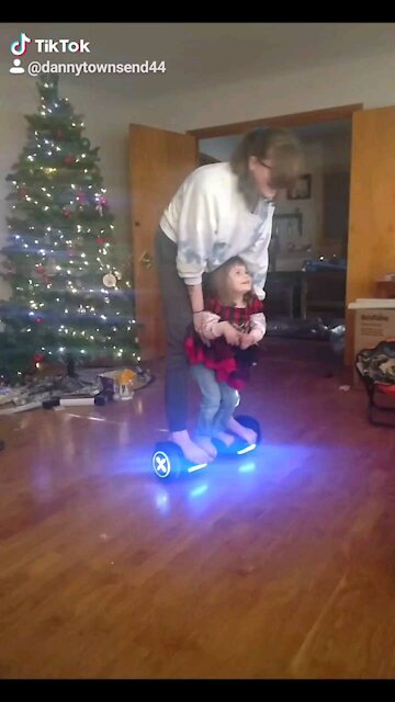 Delilah on a hoverboard