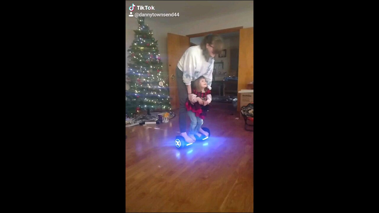 Delilah on a hoverboard
