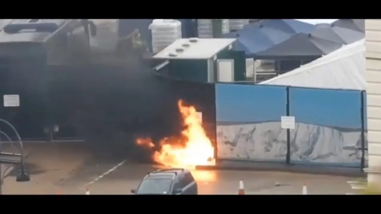 Moment ‘laughing’ man throws missile at immigration centre in Dover