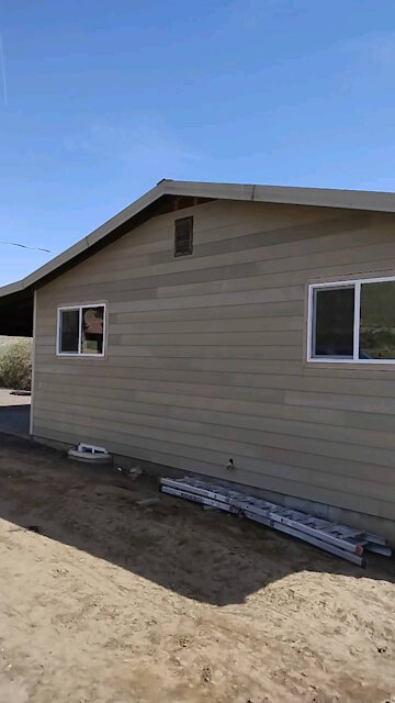 Eli helped on siding today