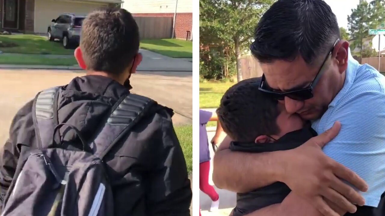 Boy runs and hugs Dad
