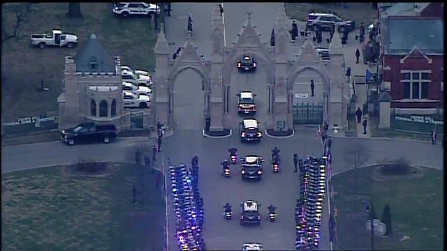 Hearse arrives at Crown Hill Cemetery (view from above)