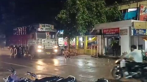 Man Sits On Chair In Middle Of Road, Gets Hit By Truck