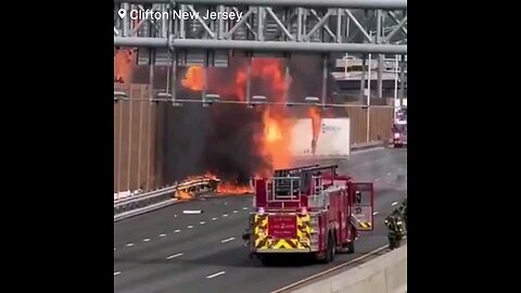 A tractor-trailer truck carrying explosive and hazardous chemicals crashed into a barrier wall