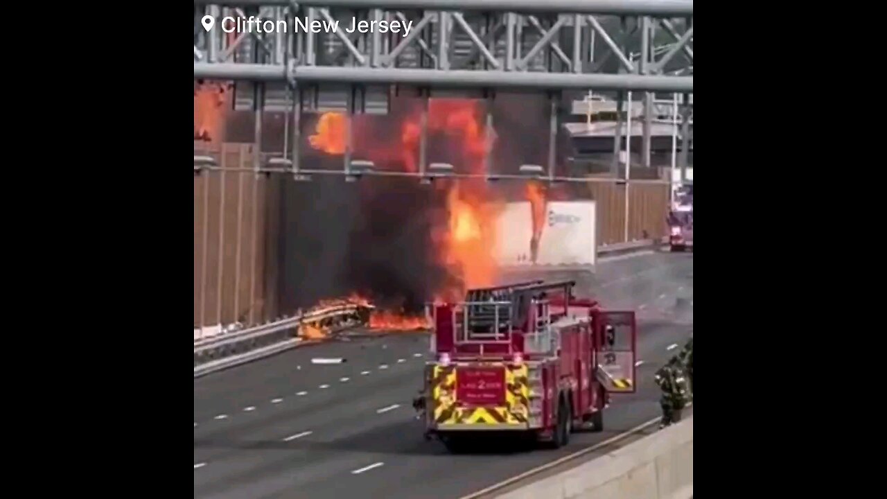 A tractor-trailer truck carrying explosive and hazardous chemicals crashed into a barrier wall