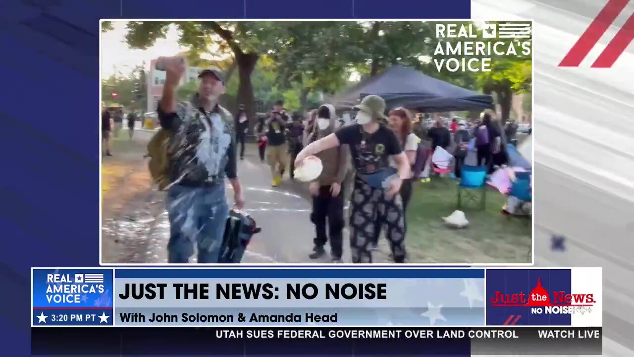 Far-left protestors outside DNC pour milk, throw jug at RAV Correspondent Ben Bergquam