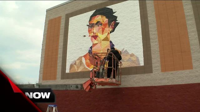 Local artist paints mural for CineLatino Film Festival