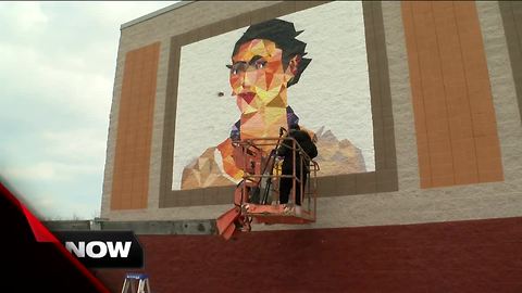 Local artist paints mural for CineLatino Film Festival