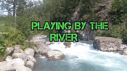 COOLING OFF BY THE RIVER LOOKING FOR GOLD