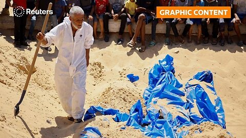 GRAPHIC WARNING: Palestinian bodies buried in mass grave following Israeli transfer | REUTERS | NE