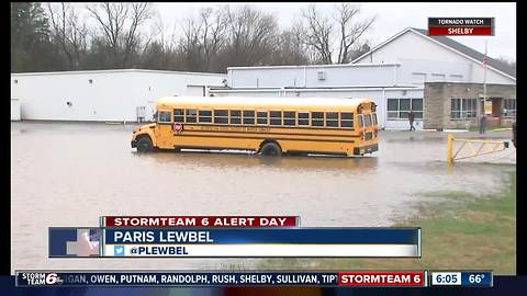 Students rescued from bus in standing water on Mass Ave in Warren Township