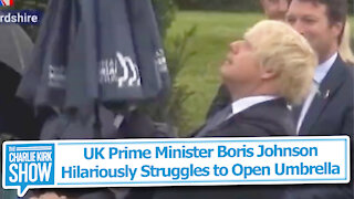 UK Prime Minister Boris Johnson Hilariously Struggles to Open Umbrella