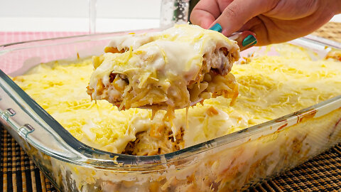 Pasta with chicken in a special white sauce in the oven.