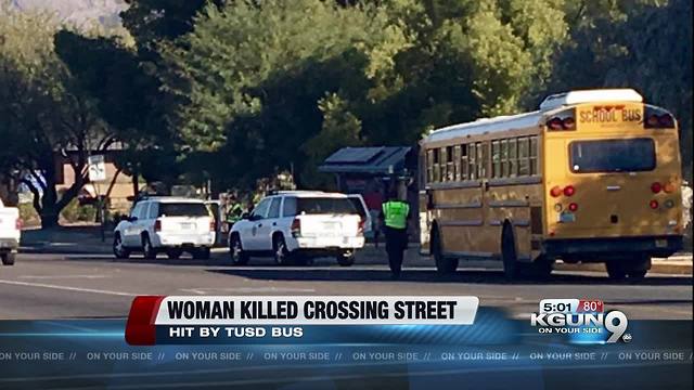 Pedestrian hit by school bus dies