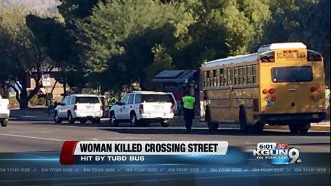 Pedestrian hit by school bus dies