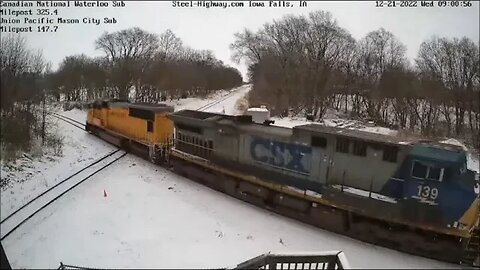 UP, CSX, CP and NS power on NB Manifest in Iowa Falls, IA on December 21, 2022