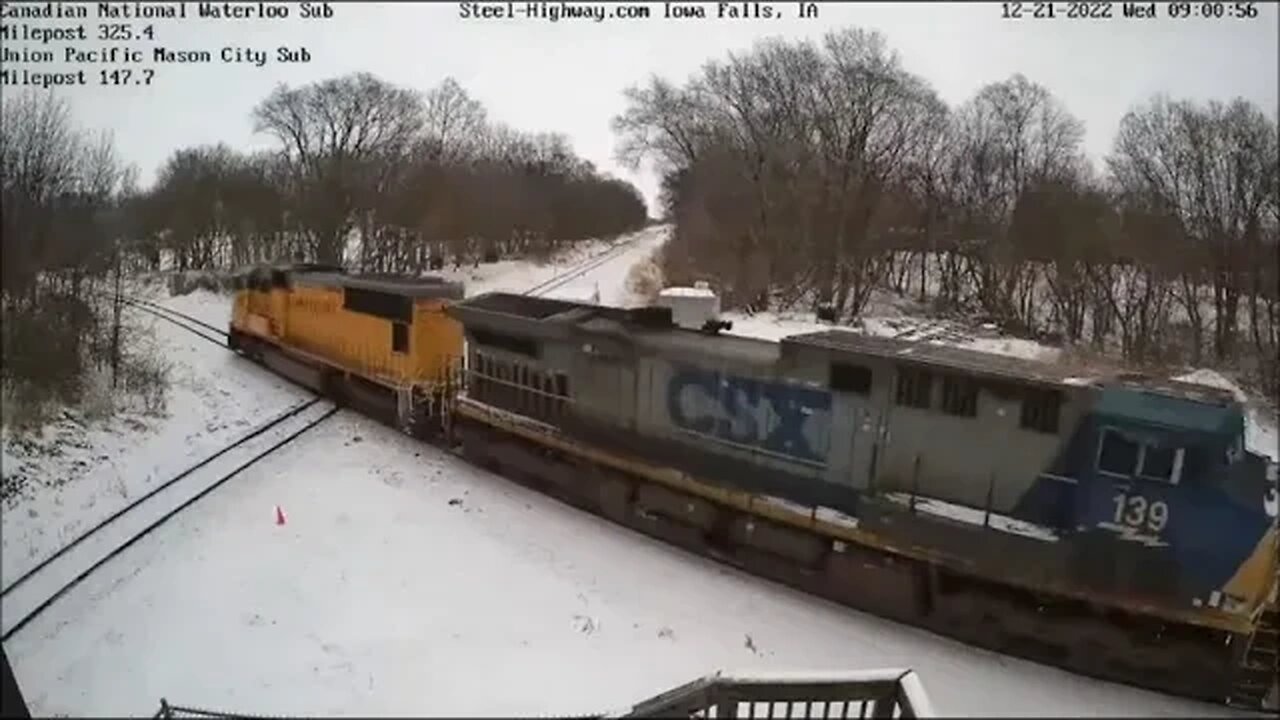 UP, CSX, CP and NS power on NB Manifest in Iowa Falls, IA on December 21, 2022
