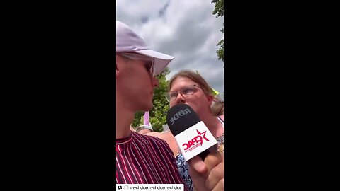 An unhinged white liberal woman loudly chants her pro-abortion stance at a rally