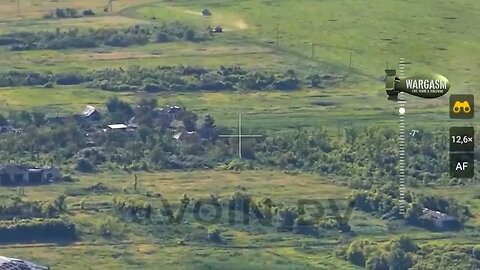 Armored vehicle driving along, suddenly explodes