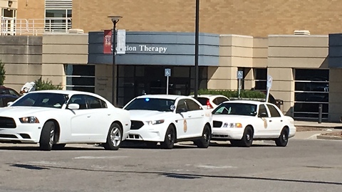 Off-duty Southport police officer tried to apprehend robbery suspect; suspect struck officer with vehicle