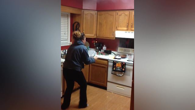 A Woman Tries To Make Popcorns And Sets The Stove On Fire