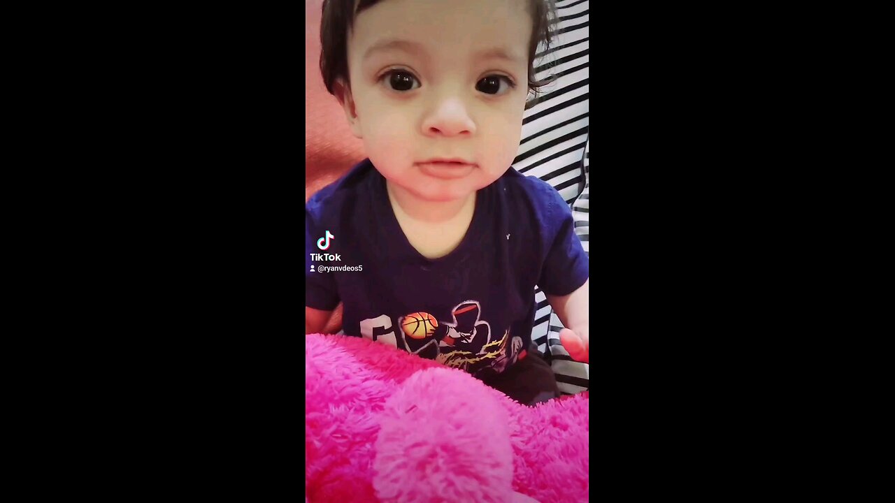 cute baby talking and playing