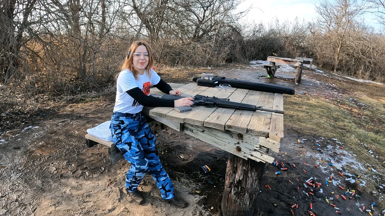 Danielle shooting Colt heavy barrel ar 15 at steel