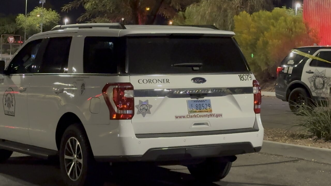 Las Vegas coroner removes deceased from behind gas station