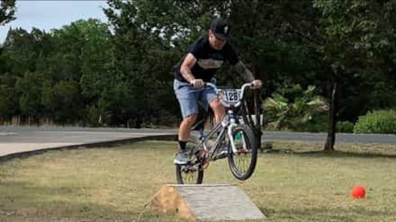 Man fails bicycle jump in style