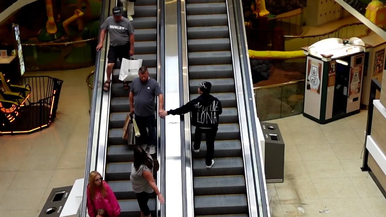 Pranking people on the escalator *GONE WRONG*