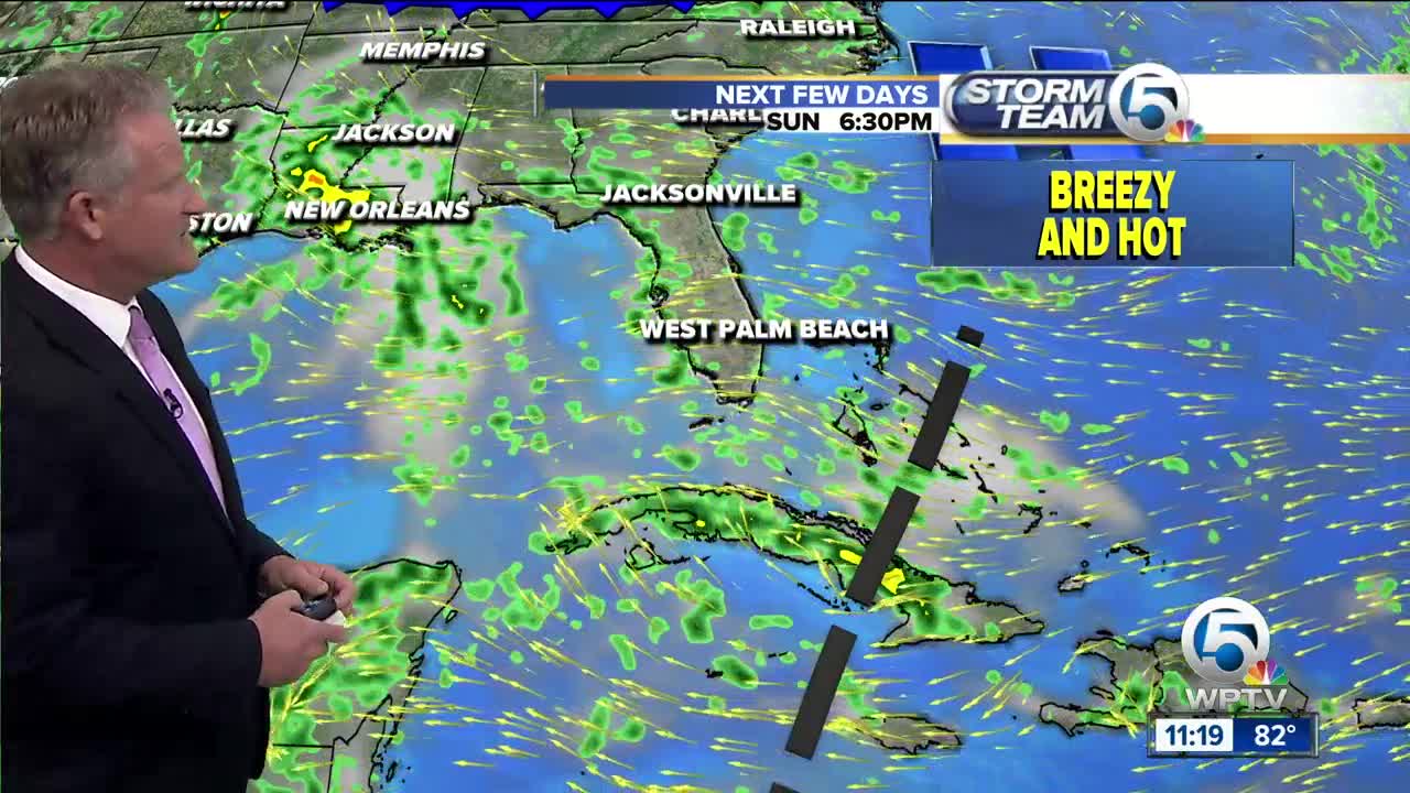 Tropical wave could make for wet Labor Day