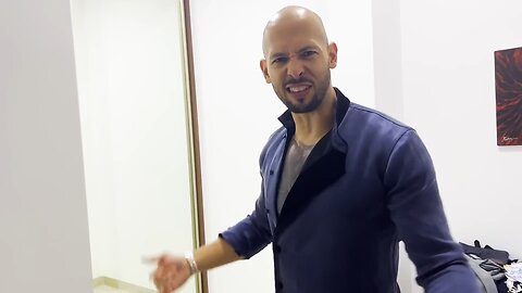 Tate talking about an expensive coat he bought and flexing