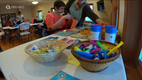 Supply bags bring joy to the care facility residents who pack them and the students who receive them