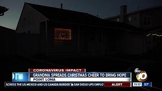 Grandma puts up Christmas lights to spread cheer