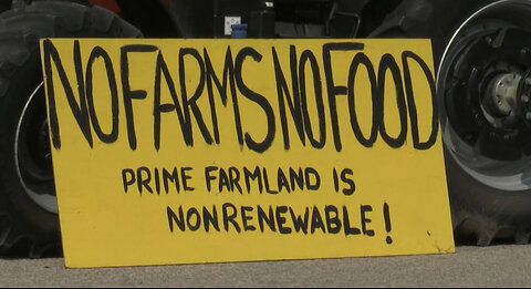 Protesting sale of Wilmot farmland