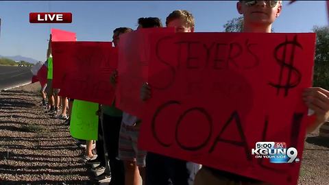 Picketers gather to rally against billionaire Tom Steyer while he is in Tucson