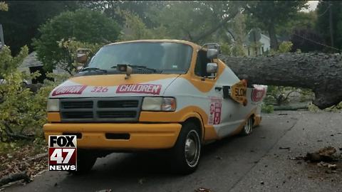 Winds cause tree to fall on ice cream truck in Kalamazoo