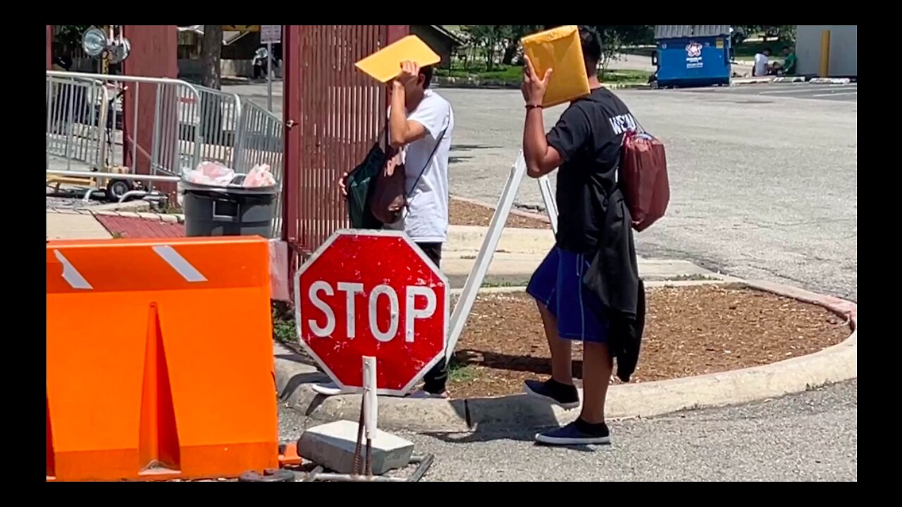 2 military aged men hiding their faces from my camera