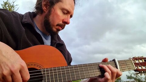 Guitar Practise in the Garden - Scott Spalding