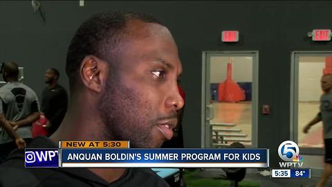NFL star Anquan Boldin hosts youth summer camp