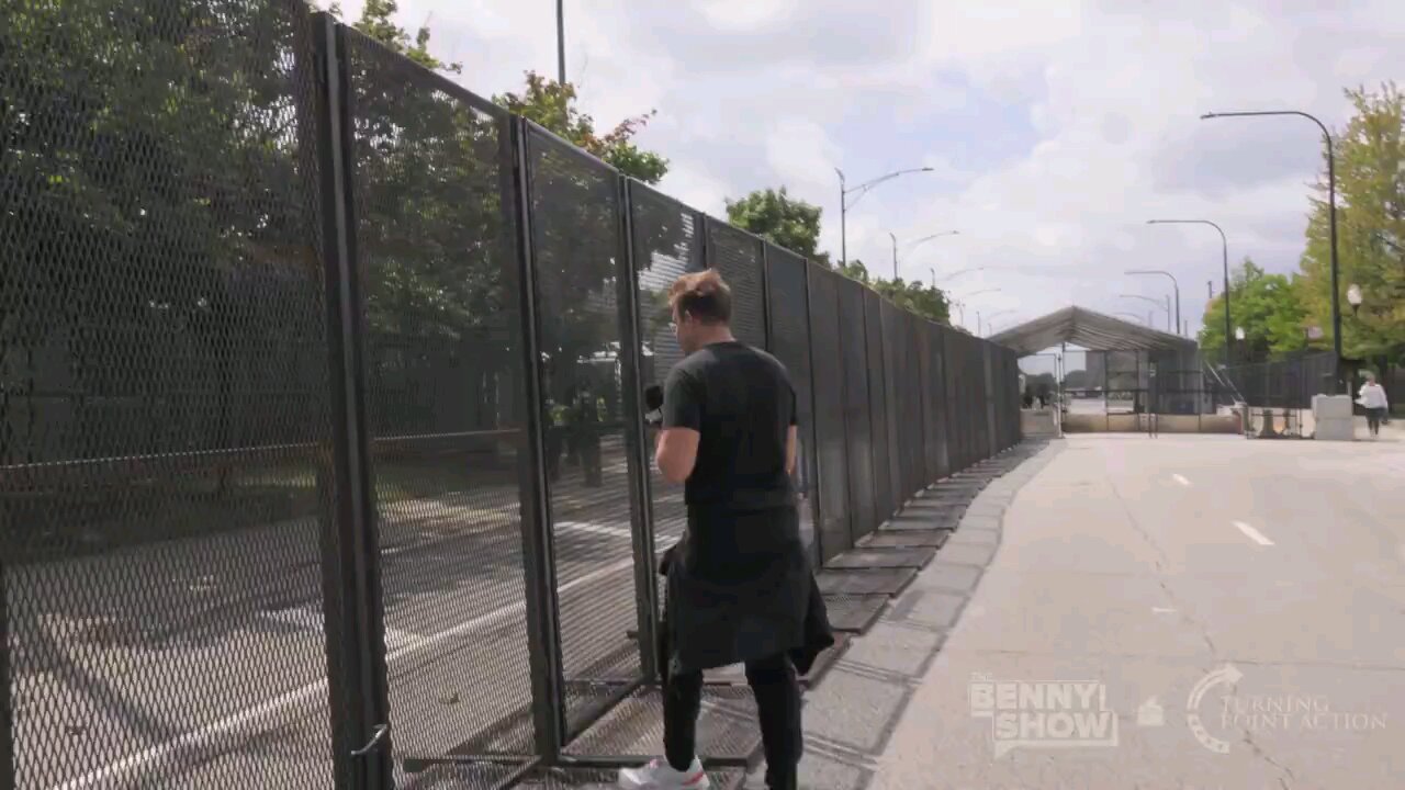 Benny Johnson walking around the DNC in Chicago showing us the walls they built for security
