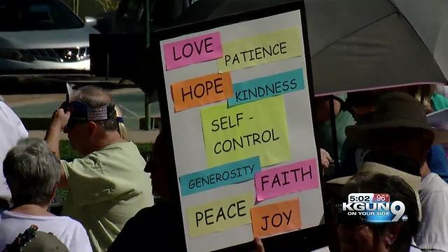 Hundreds gather at Armory Park for Keep families together rally