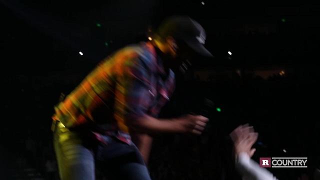 Watch Luke Bryan hit a guy in the front row for flipping him off | Rare Country